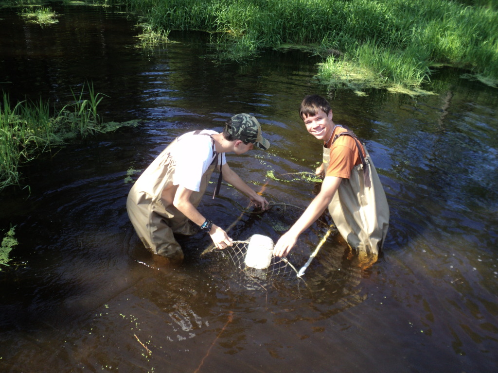 HRE students checking a turtle trap