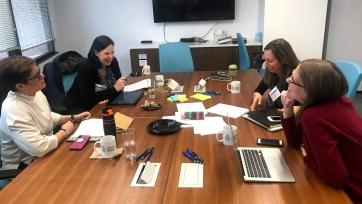 people meeting at a conference table