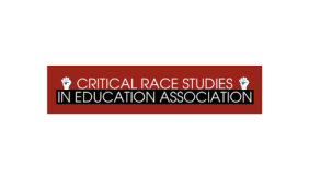 Image contains a red background with text on two lines: Critical race studies in education association. Text is bracketed by two raised fists on the left and right.