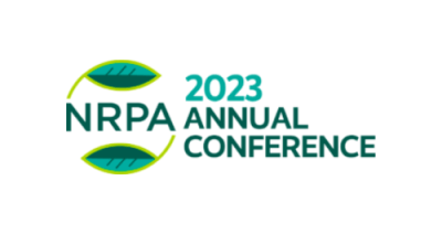 Image to the left has the letters "NRPA" in green surrounded by two leaves to create a circle. Green text to the right reads "2023 Annual Conference"